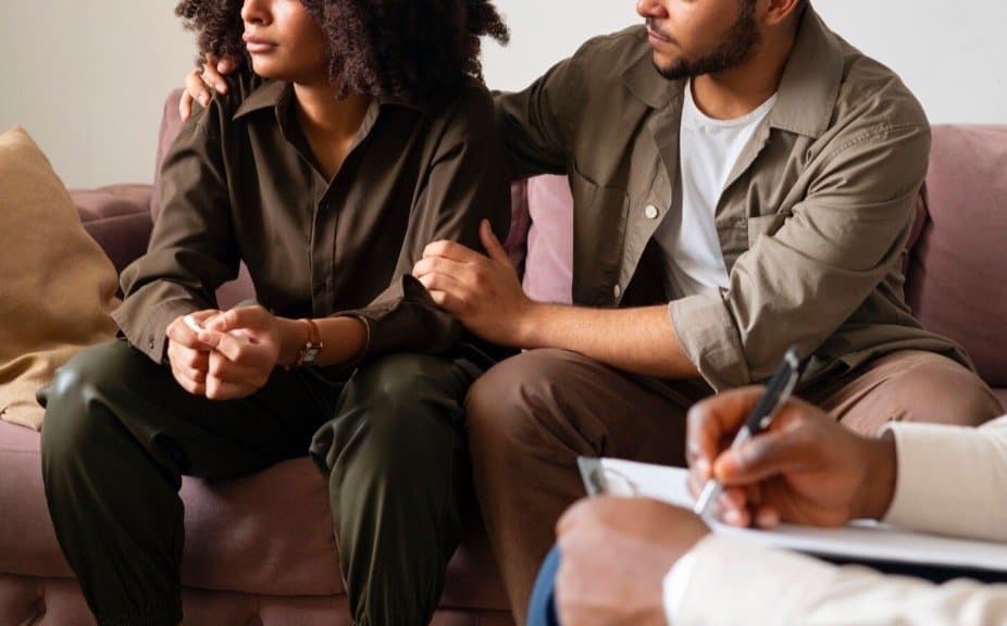 Couple sitting together in a therapy session